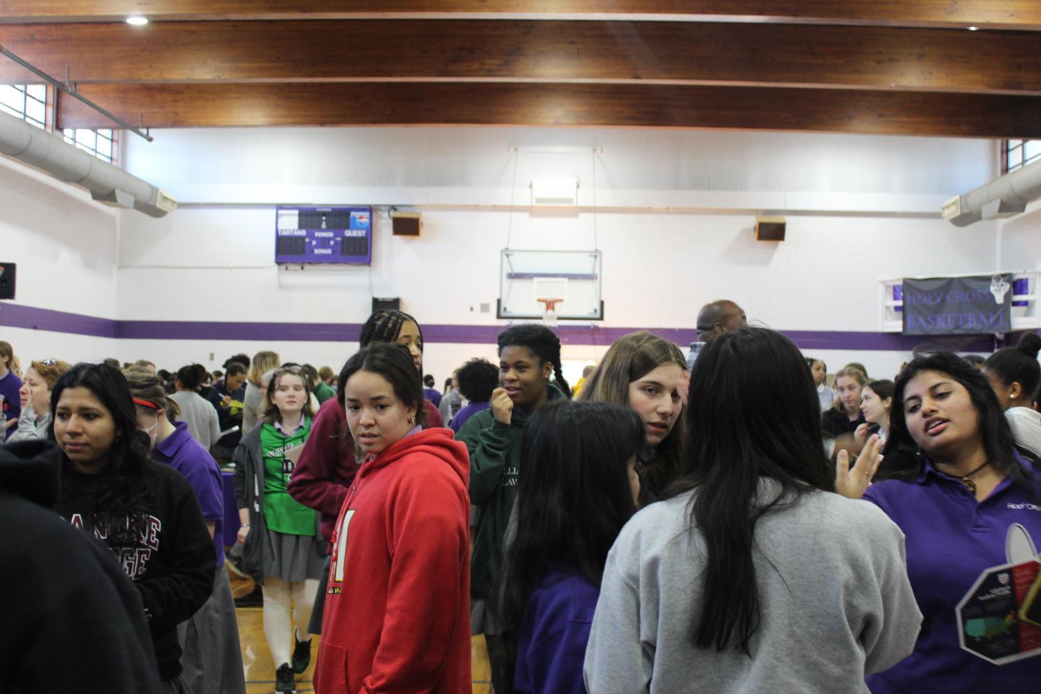 Holy Cross students fill the gymnasium  celebrating another succsesful College Day.