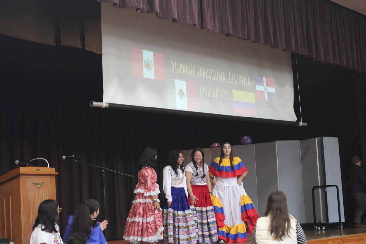 Students presenting on the stage for the Hispanic Heritage month.