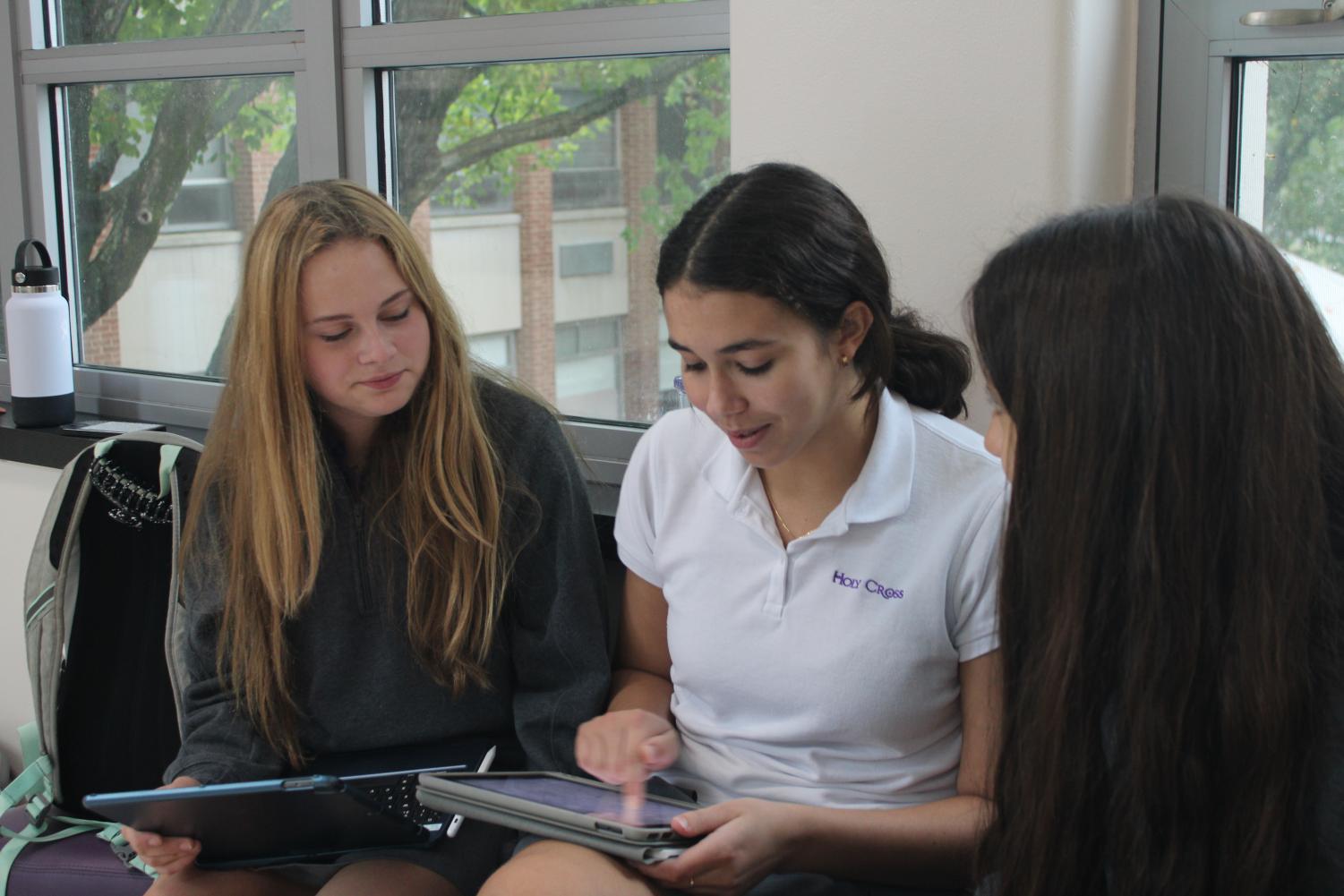 Freshmen Brennan Smith, Caroline Serra, and Carmen Aguila  study  during Tartan Time.