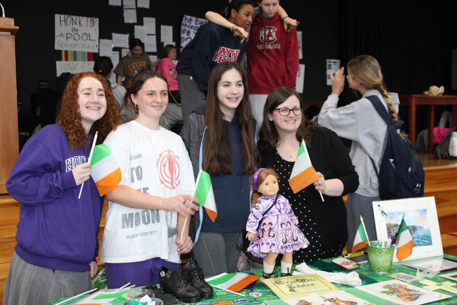 Students and teacher pose at the Irish exhibit.
