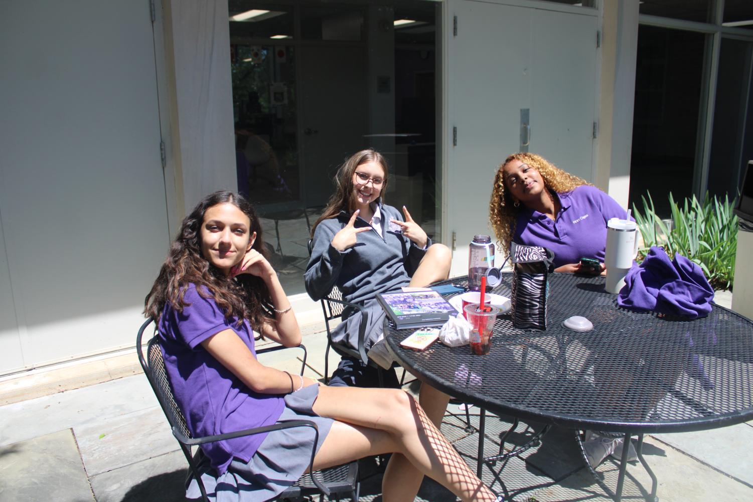 Yasmeen, Ava, and Faven take their study hall outside, while they prepare for finals week.
