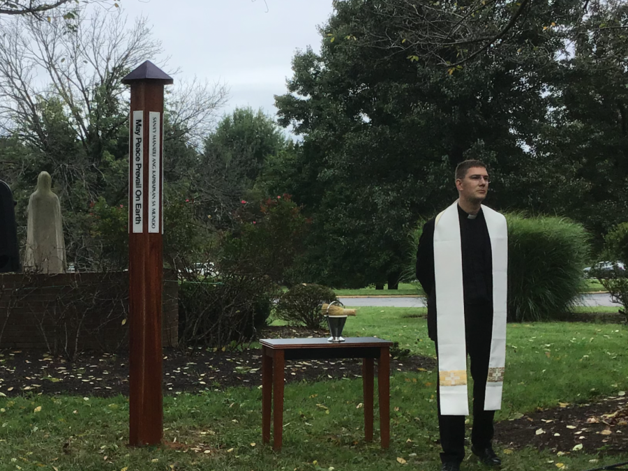 Fr. Ben Garcia delivered his sermon before blessing the Peace Pole.
