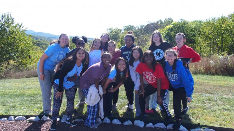 A group of juniors posing outside at the end of the retreat.