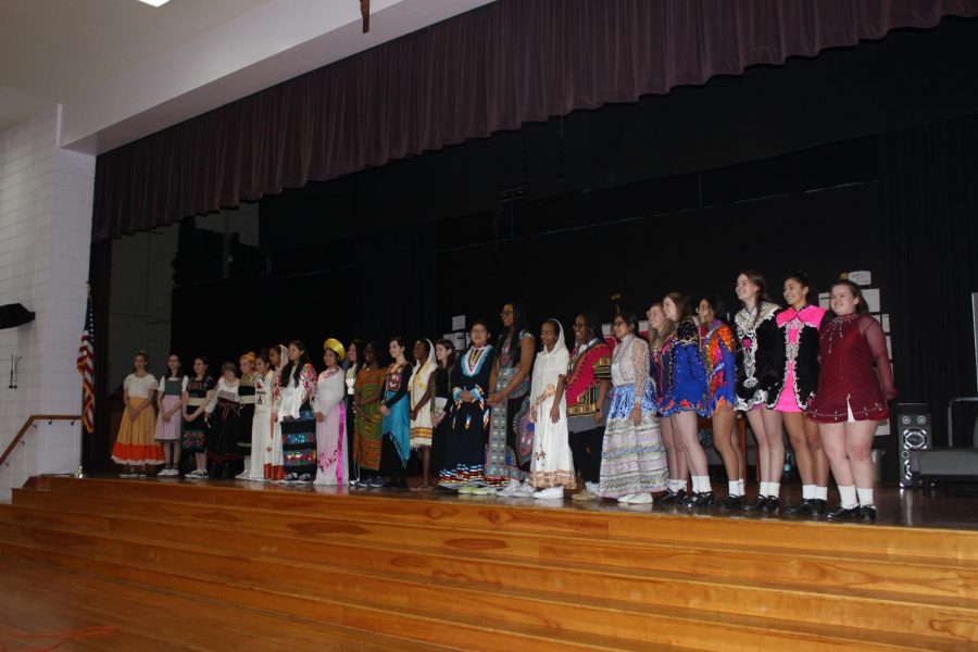 Students and faculty display their cultural outfits. 