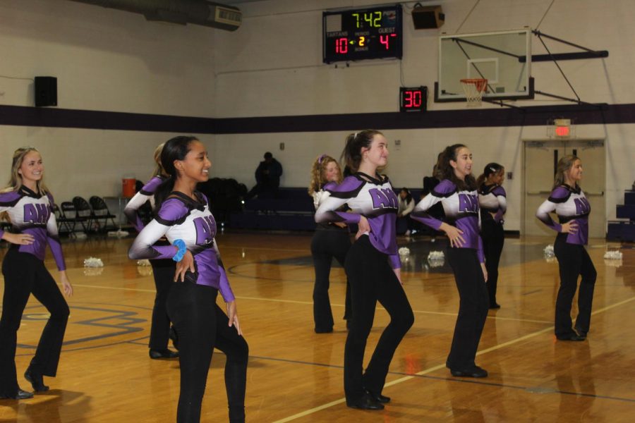 Poms team performing in the AHC gym