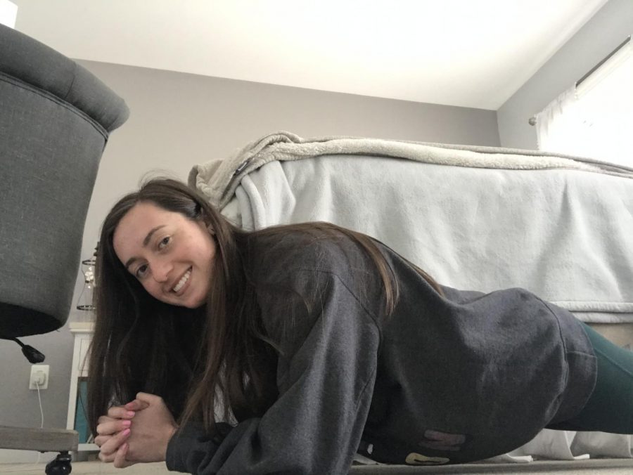 Junior Rose Zaremba has been staying active by doing ab workouts, such as planks, in her room during this time at home.