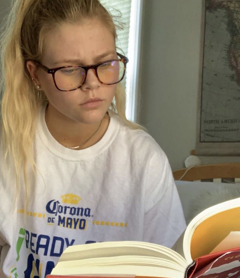Junior Cassie Fredell fills newfound free time due to COVID-19 with productive activities that help benefit her mental health, including reading.