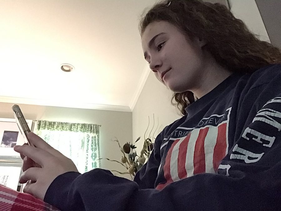 Junior Eileen McConville using social media while at home to remain connected with friends.