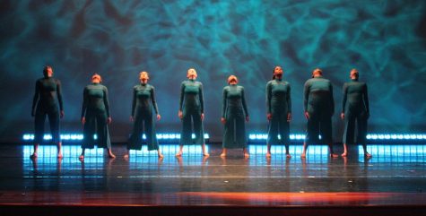 The Adrenaline Dance Team on the stage, posing.