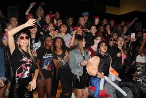 Seniors singing on the stage.