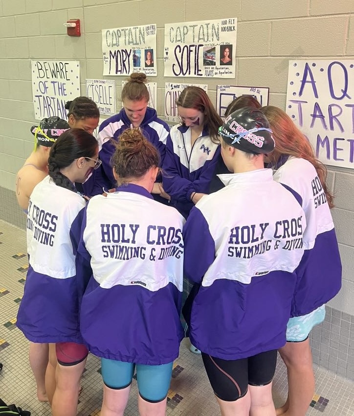 The+swim+team+prayer+before+the+Metros+meet+at+Germantown+Aquatic+Center.+They+are+ready+to+swim+fast+and+make+achieve+best+times.