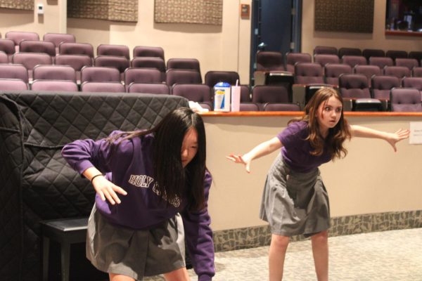 Two students practicing a dance routine