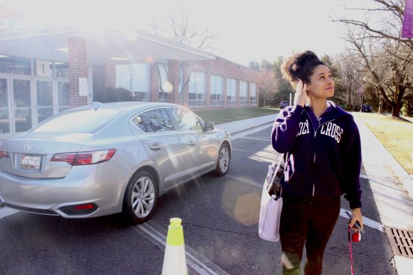 Junior Vanessa Elie getting dropped off outside door #1 for the school day.  