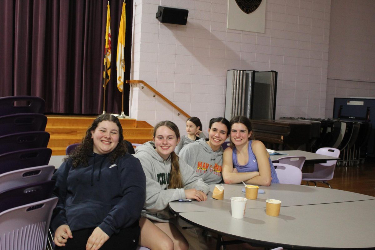 Alex McCormick and friends enjoy soup at empty bowls night. 