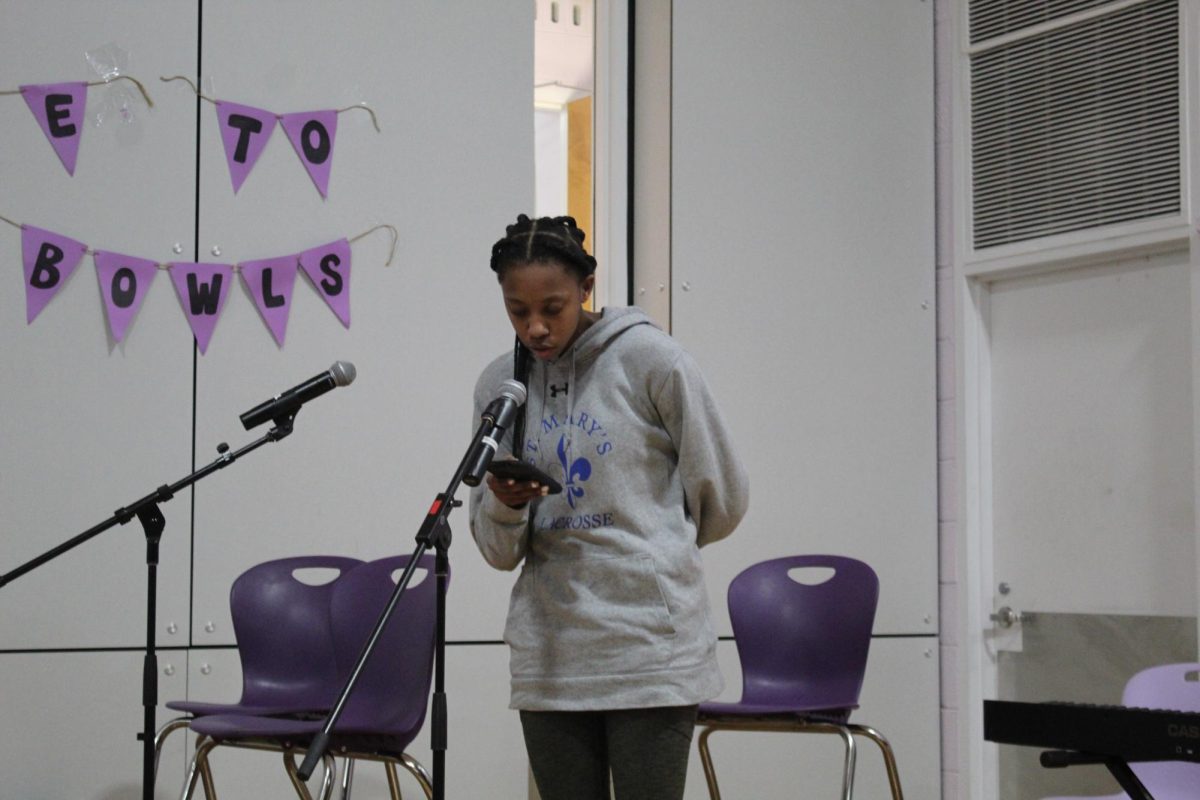 Jaylen Ndaka performs a poem.