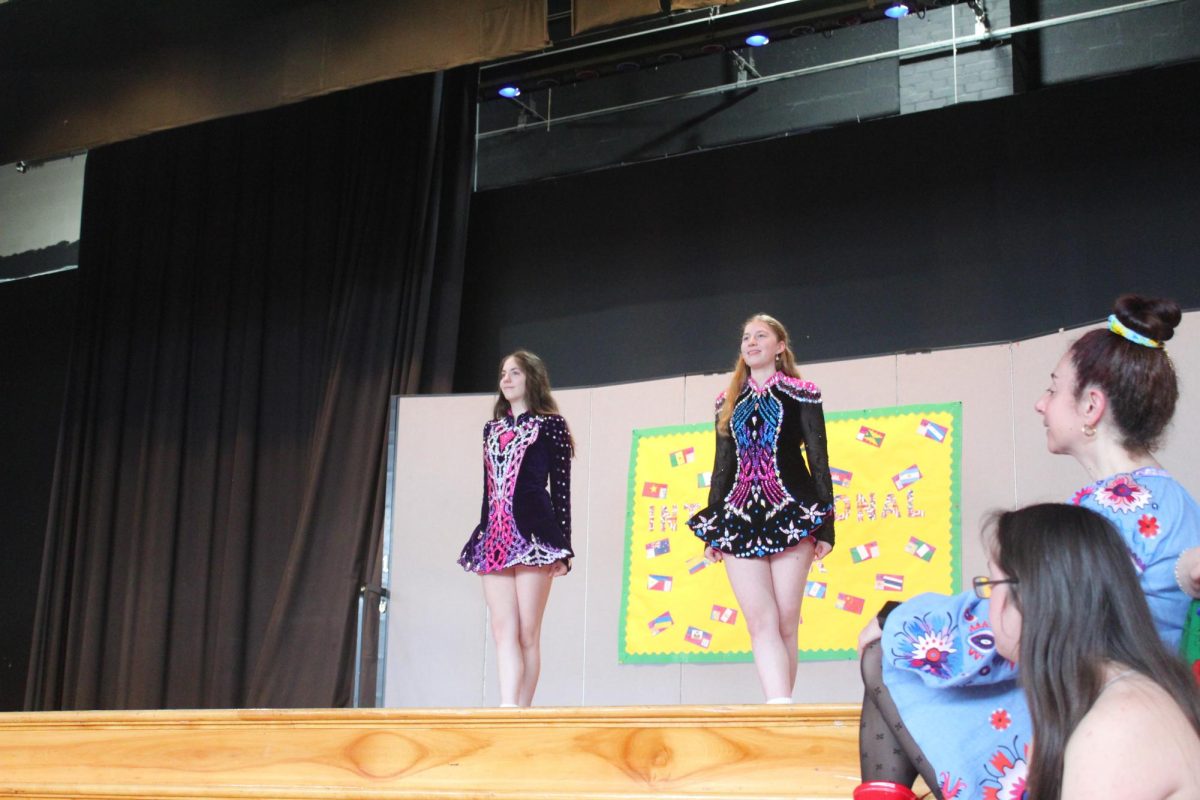 Sophia Ott and Lily Buck perform Irish Dancing during the International Fashion Show. 