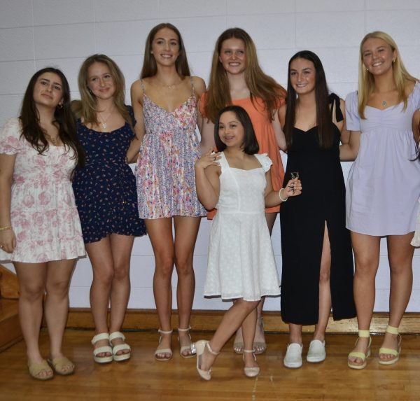 Juniors happily posing for a picture after receiving their ring at the ceremony.