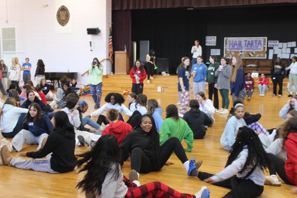 A group of teenagers playing a game.